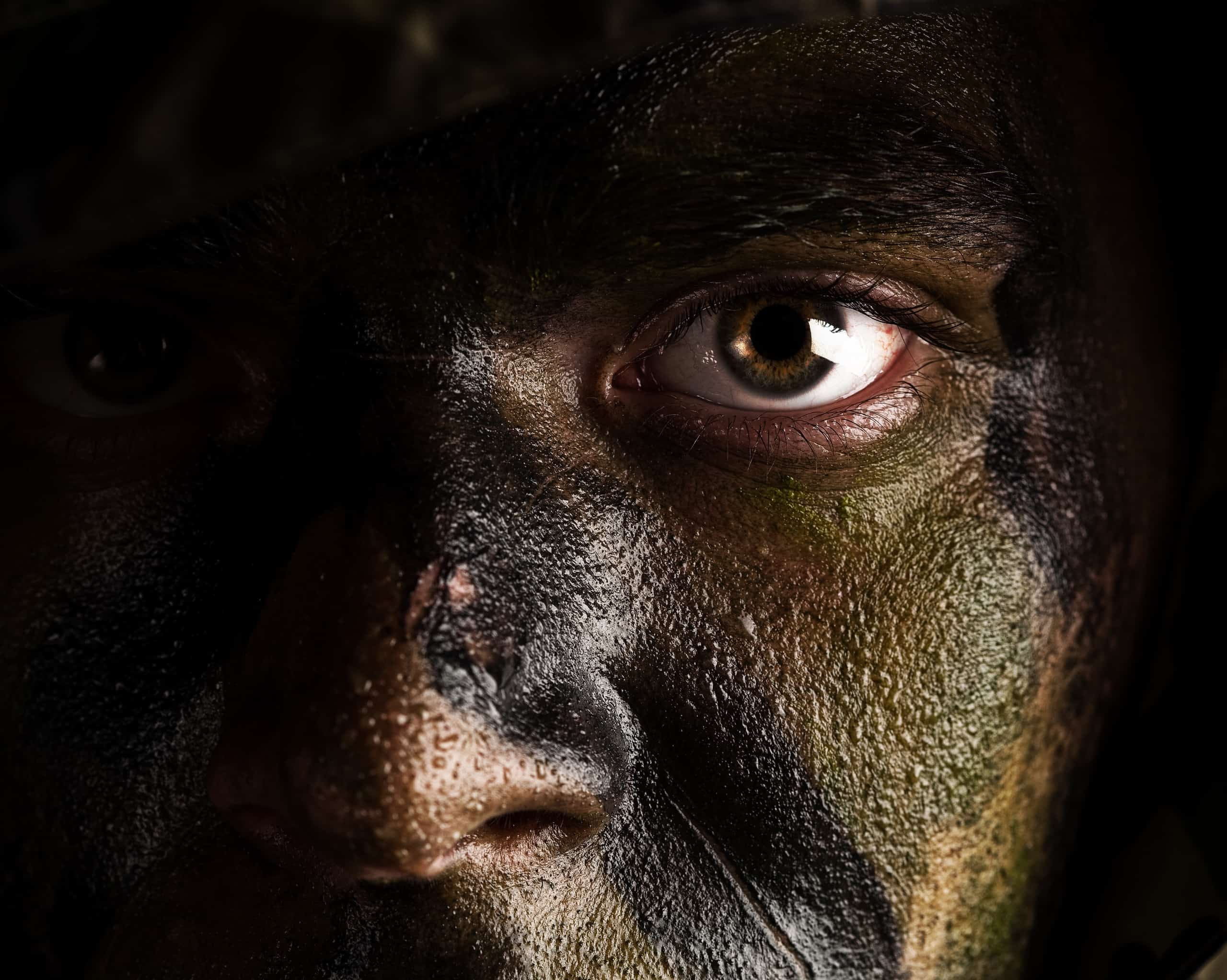 Soldier's camouflaged face